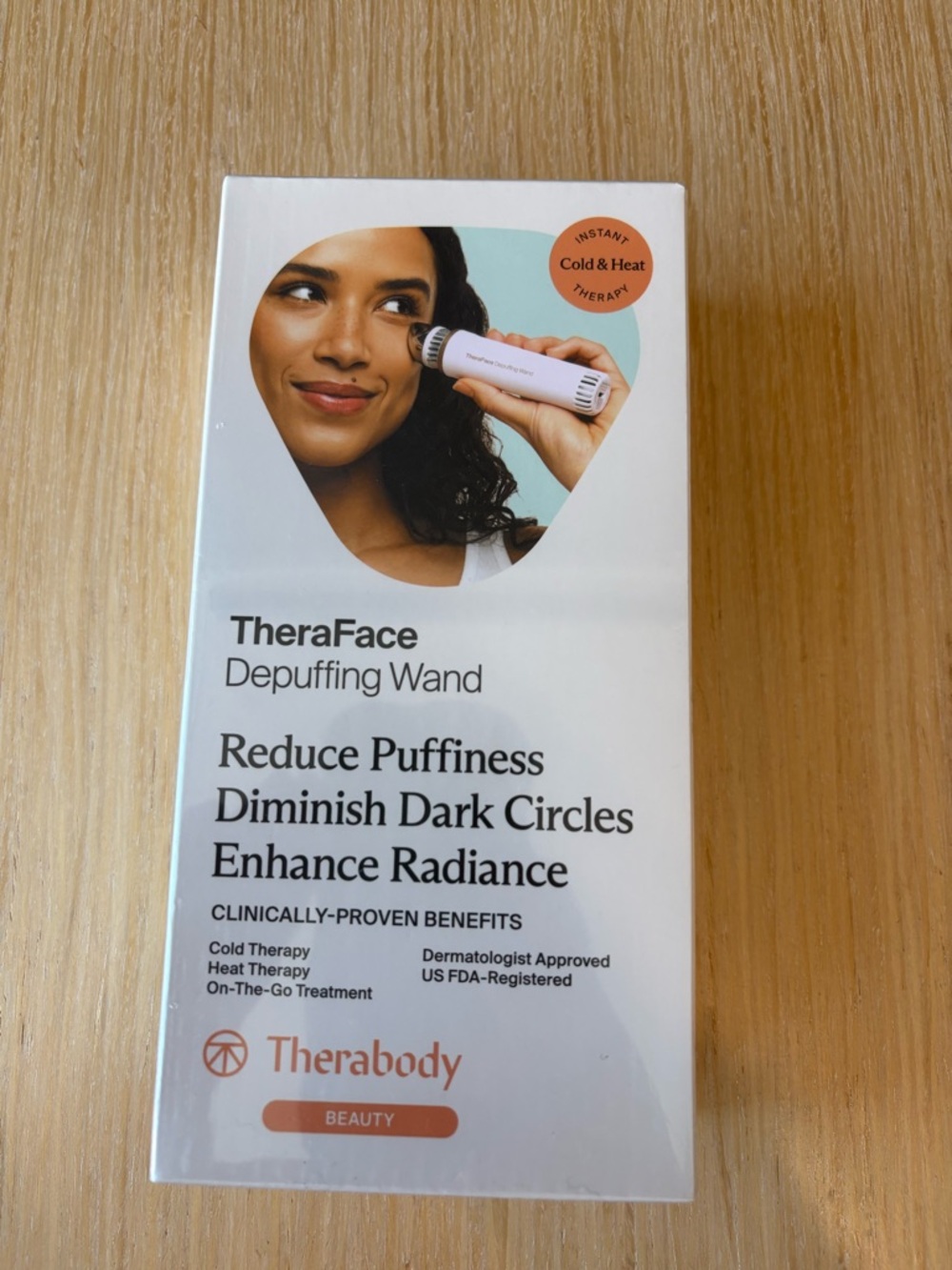 Brand new in sealed box Therabody TheraFace Depuffing Wand - White and Peach
